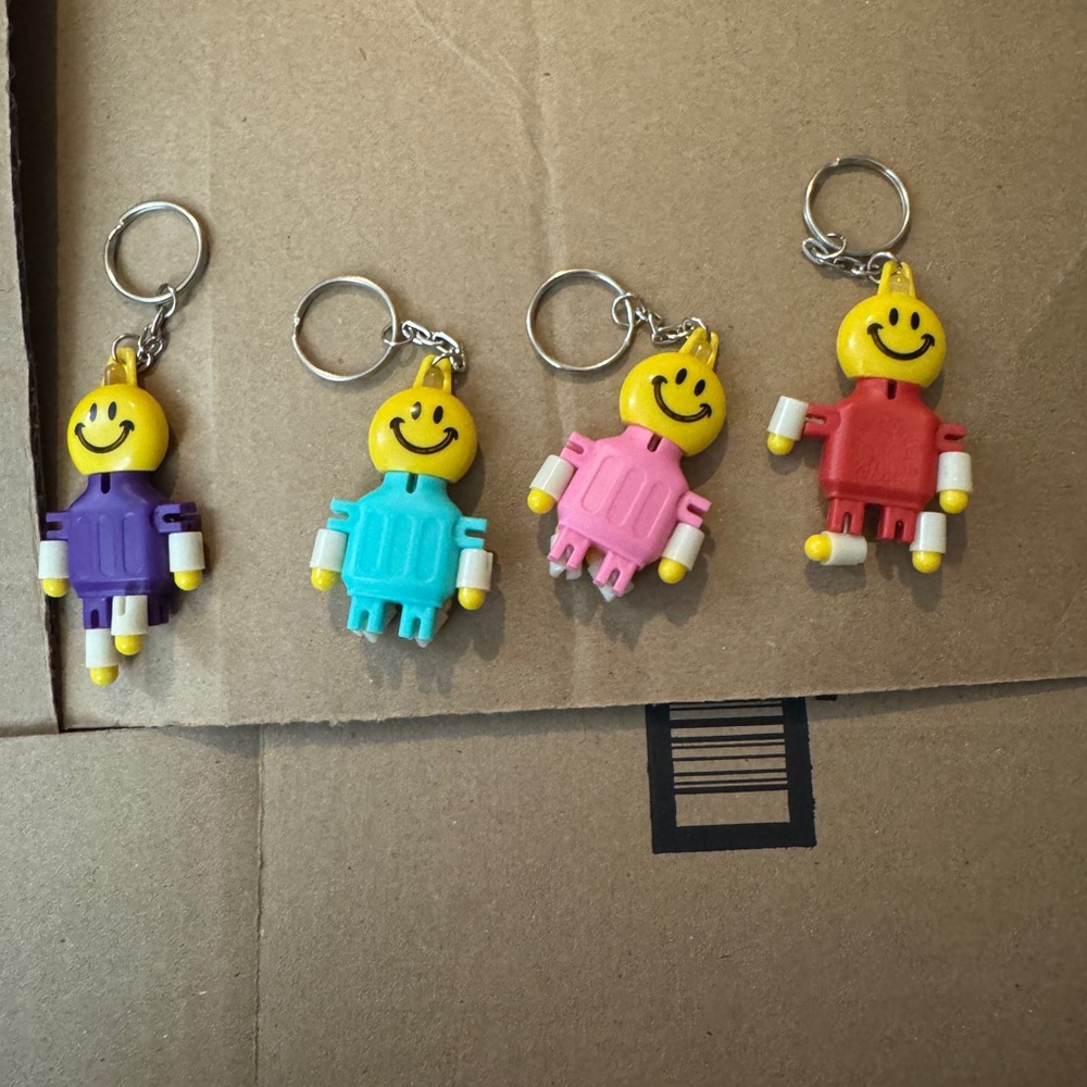 Set of 4 Colorful Smiley Face Robot Keychains